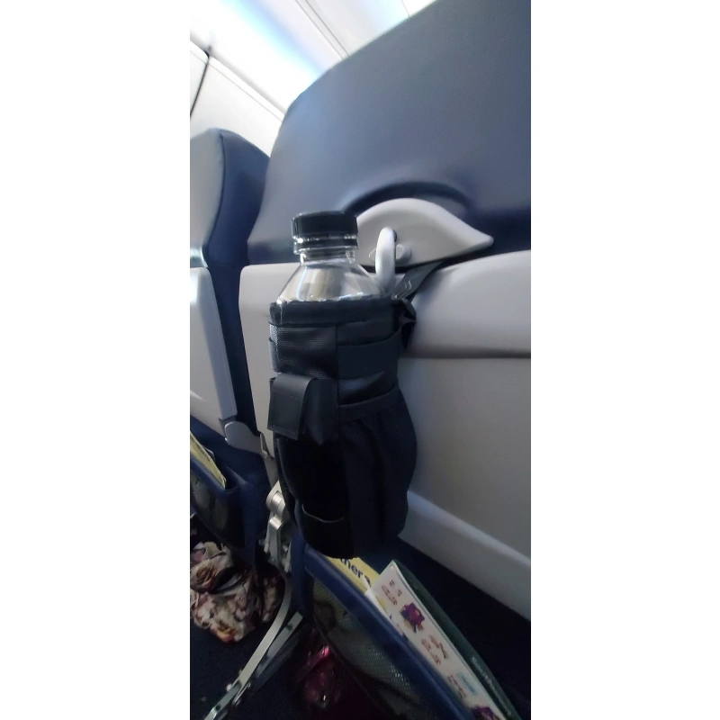 Wingmate original on plane holding water bottle